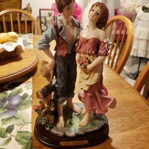 De Elina Peasant Couple Statue